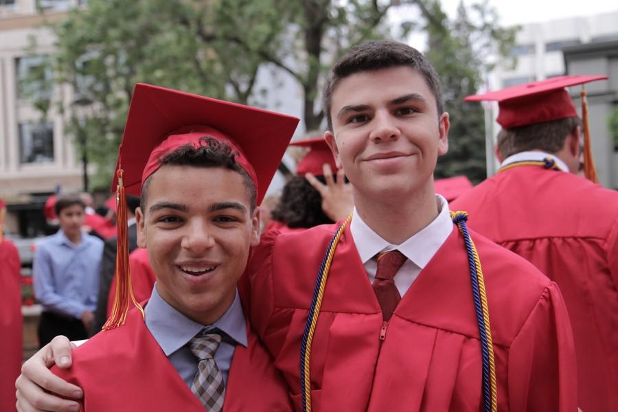 Jared Borg wears the CSF lifetime member cords with arm around Anthony Fernandez at Graduation in June of 2015.