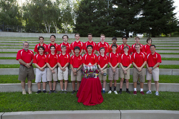 Cassidy (top row, third from right) poses with Cuttlefish and the 2015-16 robotics team.