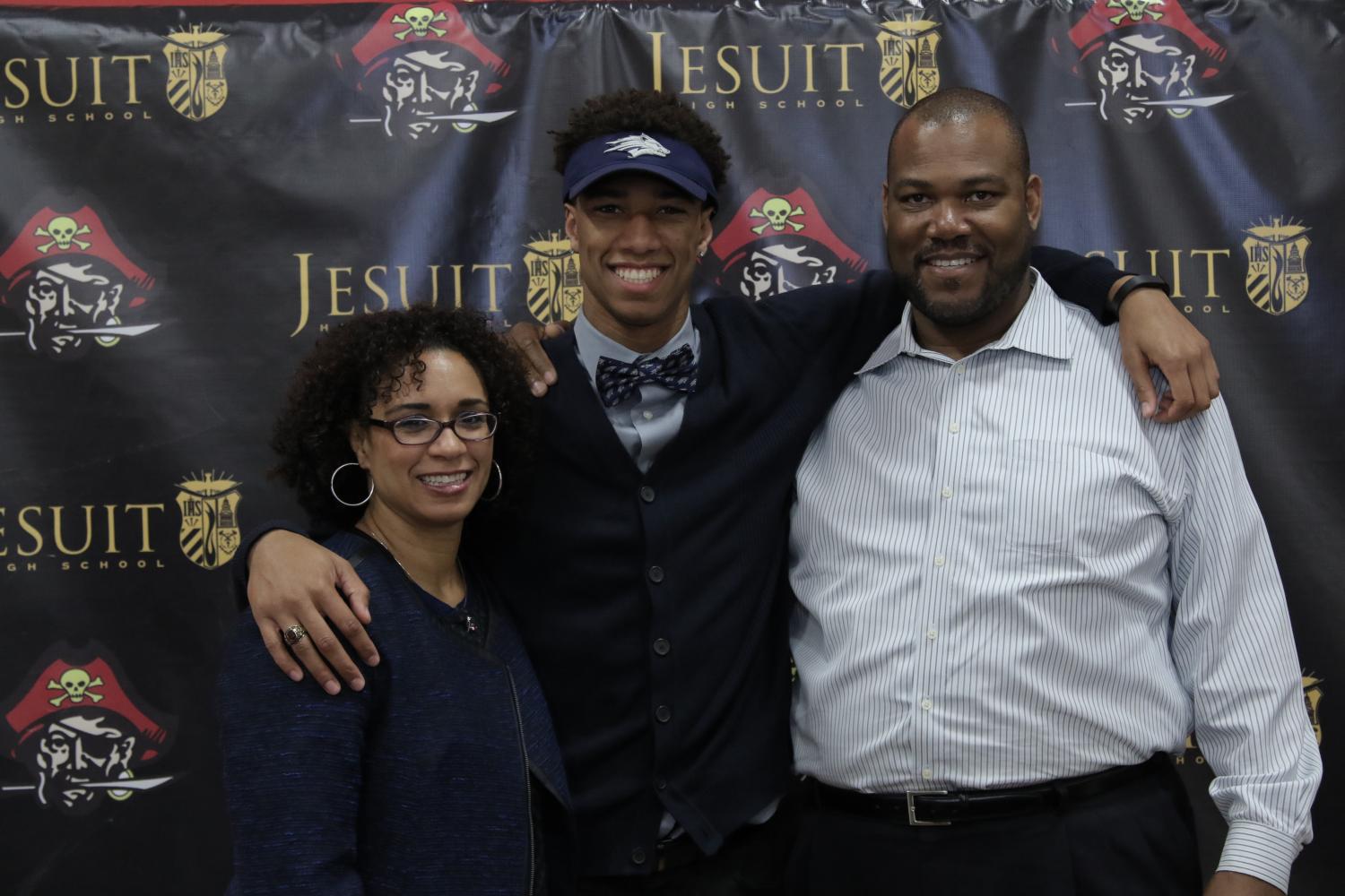 Kori Collons poses with family on National Signing Day in 2015. | Jesuit Communications