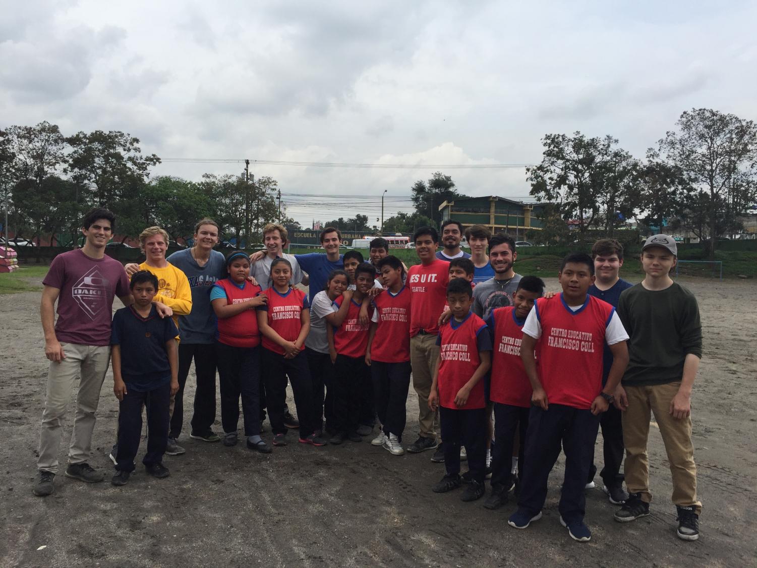 The Guatemala Immersion Team poses for a picture after playing soccer with students from a District Three elementary school.