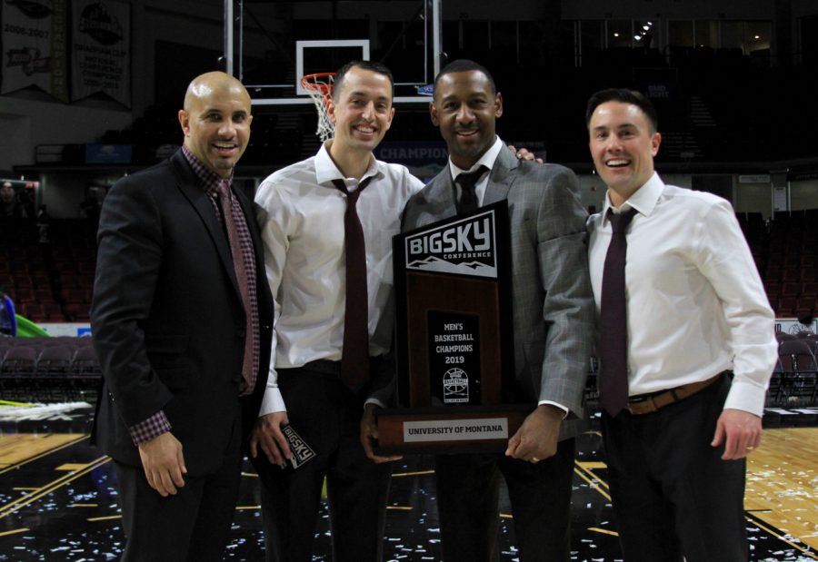 Jay Flores 07 (second from the left) pictured with the coaching staff of the University of Montana after winning the Big Sky Championship. 
