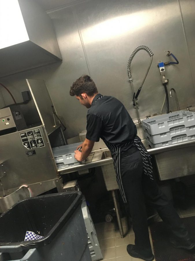 Grant Houle ’20 working at Leatherbys Family Creamery.