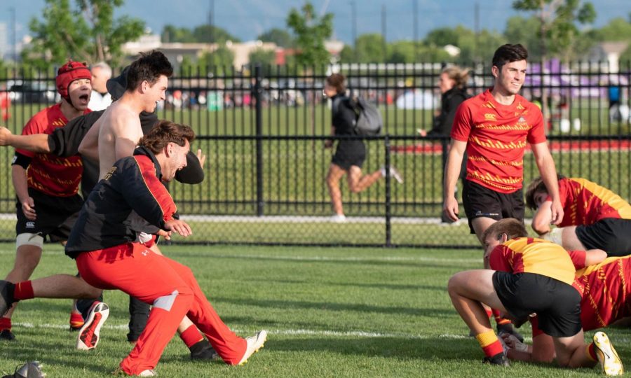Members of the 2019 Jesuit High School rugby team rush the field after winning the National Championship.