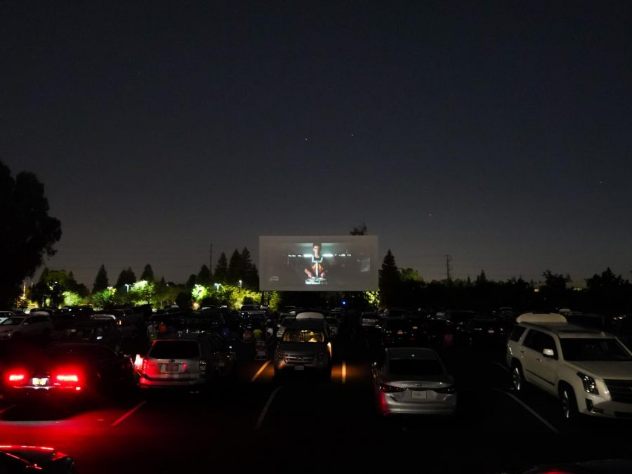 Members of the senior Class of 2020 watching Jesuit’s “We Are One,” a movie celebrating their socially distanced graduation at the West Wind Drive-in Theater with their families, on Wednesday, June 3, 2020, in Sacramento, California.